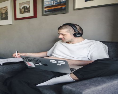 man working on a laptop at home in Bulgaria